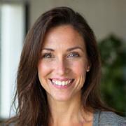 Professional photo of Sarah Thompson, a compassionate wellness coach